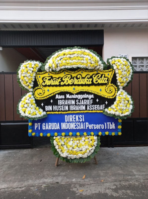 Papan Bunga Duka di Kayu Bongkok