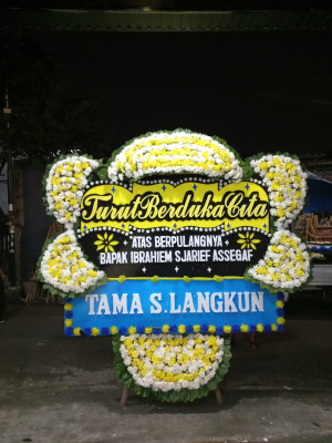 Papan Bunga Duka di Kayu Bongkok